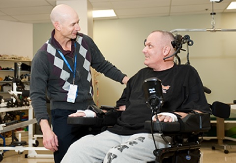 Occupational Therapist working with a Veteran in a Wheelchair