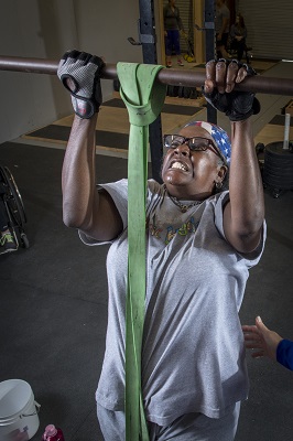 Veteran doing pullups for recreation therapy